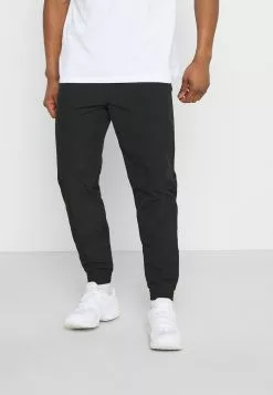 YOURTURN Bon Rapport Coût-Efficacité UNISEX - Pantalon de survêtement trouser Normale all